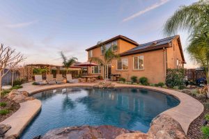 A house with a pool.