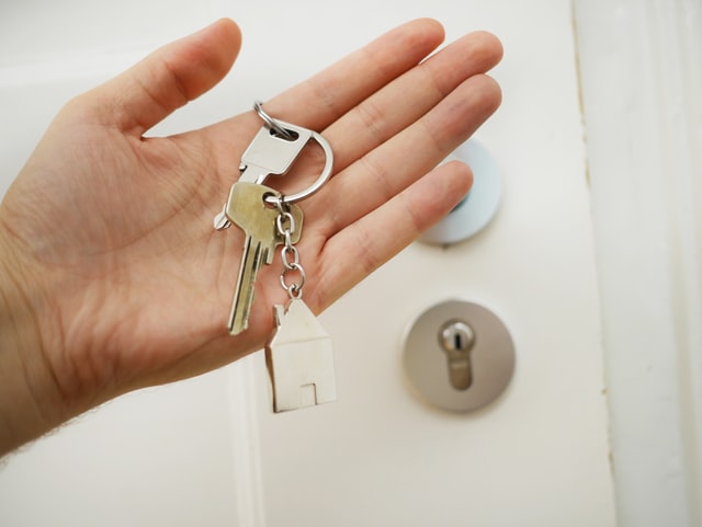 A hand holding keys