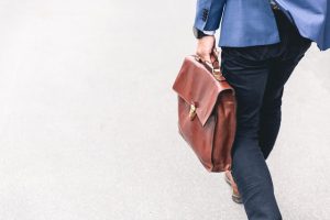 A man carrying a briefcase